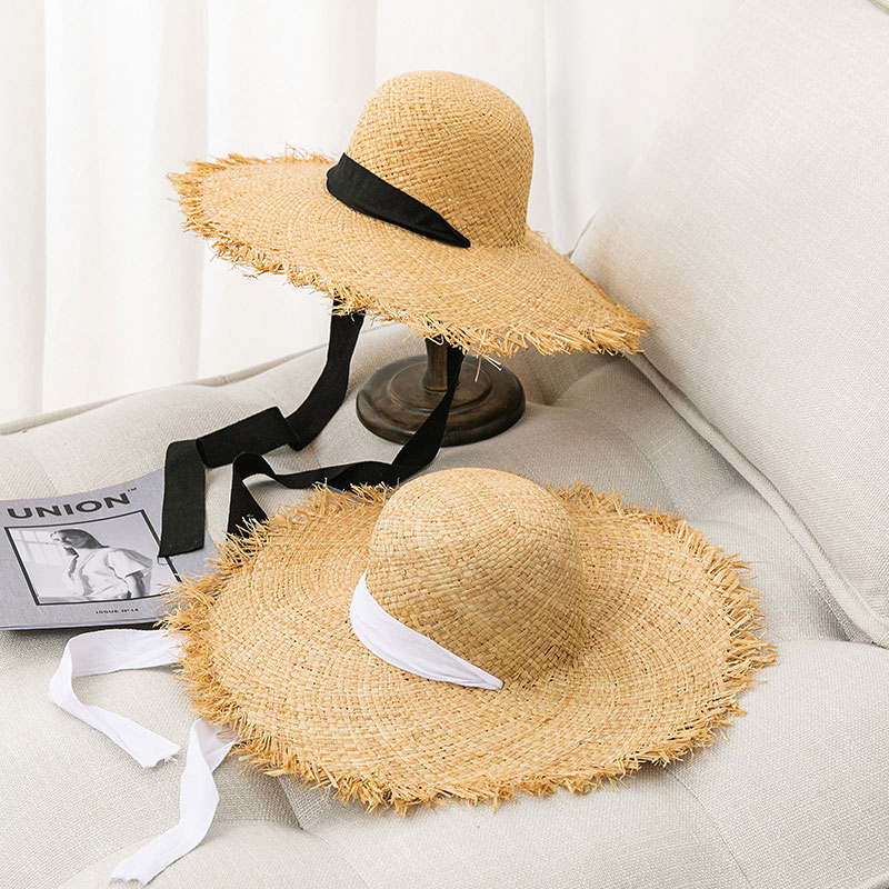 Kvinnlig Raffia Floppy Hat med hakrem